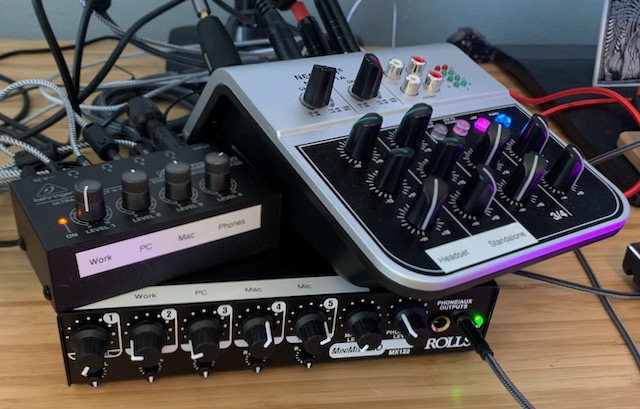 Two mixers, a headphone amp, and a mess of cables