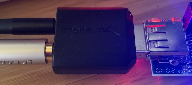 A small Sabrent USB audio interface